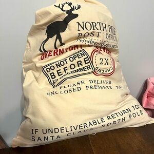 Santa sack. Filled with $500+ value luxury and designer items. Details below.